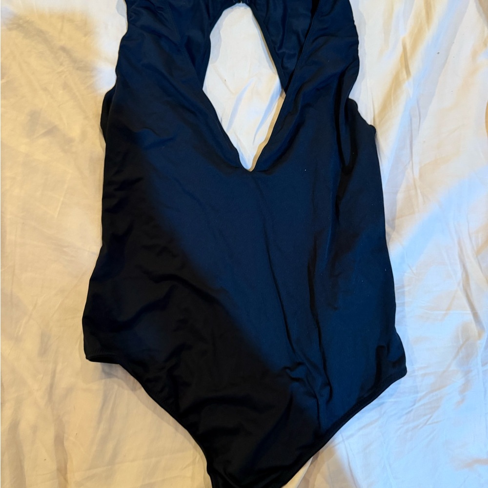 Victoria’s Secret Black bodysuit, size medium.